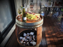 Load image into Gallery viewer, Ultimate Entertainer barrel with cheese and fruit platter on the top and a slab of beer down below in the ice bucket.
